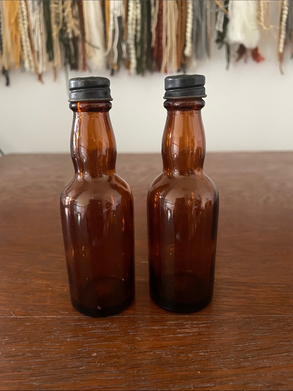Vintage Amber Glass Mini Bottle Pair - salt and pepper shakers